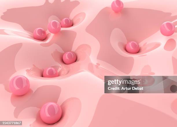 3d digital render of a group of spheres bouncing in a liquid surface. - glitschig stock-fotos und bilder