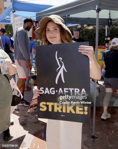 Burbank, California Actress Mandy Moore joins SAG-AFTRA and WGA members as they walk the picket line on Day 2 at The Walt Disney Co. Studios on July...