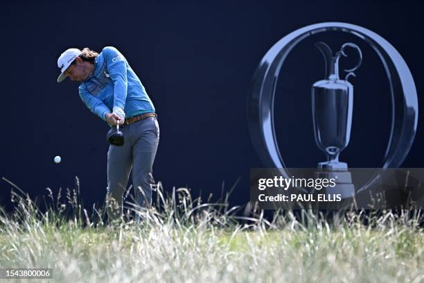 Australia's Cameron Smith drives off the 1st tee on day one of the 151st British Open Golf Championship at Royal Liverpool Golf Course in Hoylake,...