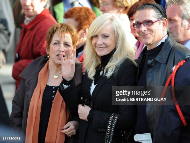 French singer Michele Torr and her husband Jean-Pierre Murzilli , arrive at the Notre Dame cathedral to pay her tribute to Franco-Belgian nun Sister...