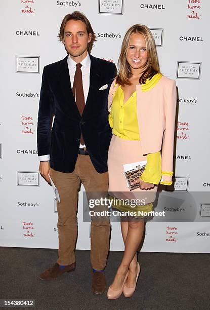Alexander Gilkes and Misha Nonoo attend the 2012 Take Home a Nude Benefit Art Auction at Sotheby's on October 18, 2012 in New York City.