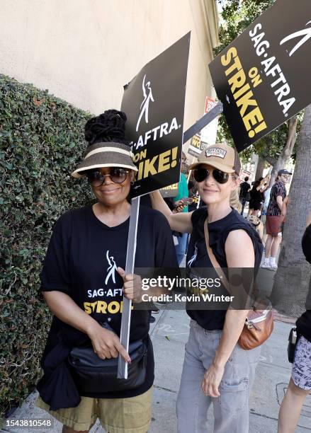 Yvette Nicole Brown joins SAG-AFTRA and WGA members as they walk the picket line on Day 2 at Warner Bros. Studios on July 14, 2023 in Burbank,...