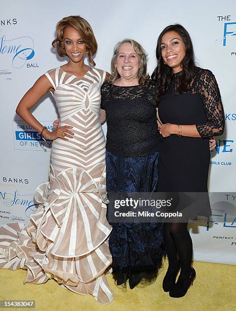 Model and television personailty Tyra Banks, Executive Director of The Lower Eastside Girls Club of New York, Lyn Pentecost, and actress Rosario...