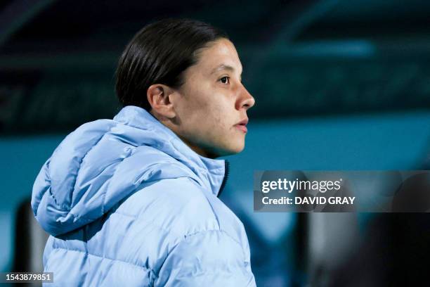 Australia's forward Sam Kerr observes from the sidelines after being ruled out from the Australia and New Zealand 2023 Women's World Cup Group B...