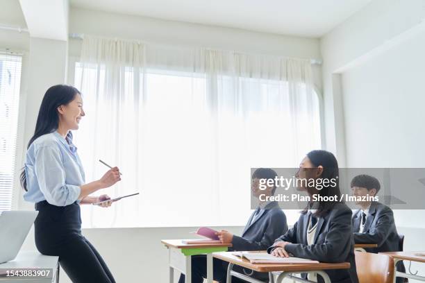 teacher and students in class - korea university stock pictures, royalty-free photos & images