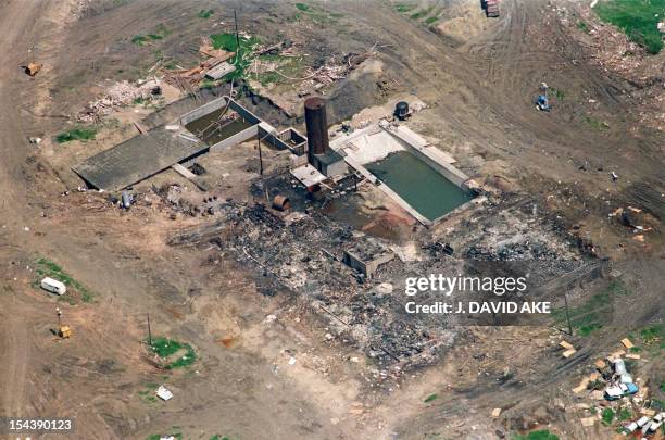 This aerial shot taken 21 April 1993 in Waco from the government mandated 5000 feet shows the burnt remains of the only structure left standing after...