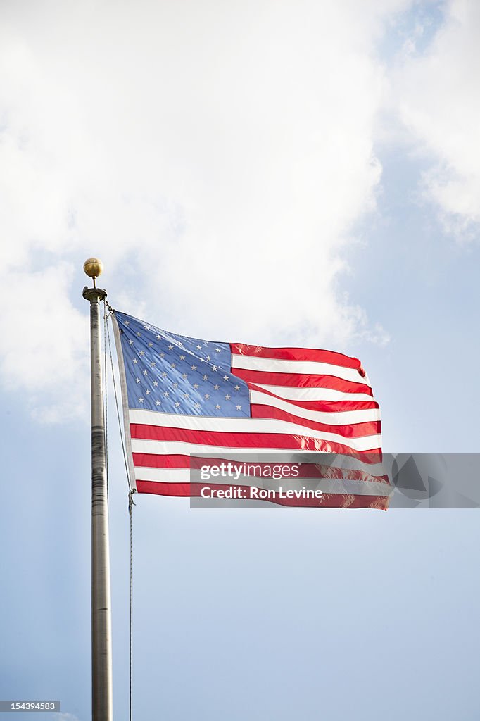 American flag against a blue sky