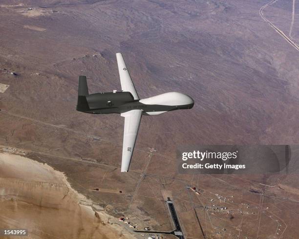 The Global Hawk unmanned aerial vehicle displays its new paint scheme in this undated photo. The Hawk is a long-endurance, high-altitude unmanned...