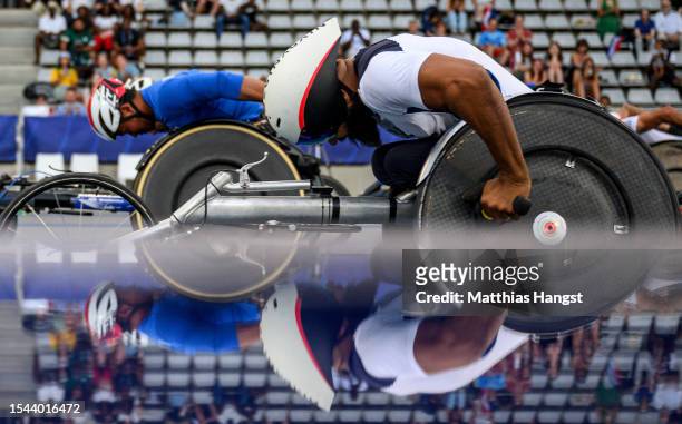 Pongsakorn Paeyo of Thailand competes against Ariosvaldo Fernandes of Brazil in the Men's 100m T53 Final during day seven of the Para Athletics World...