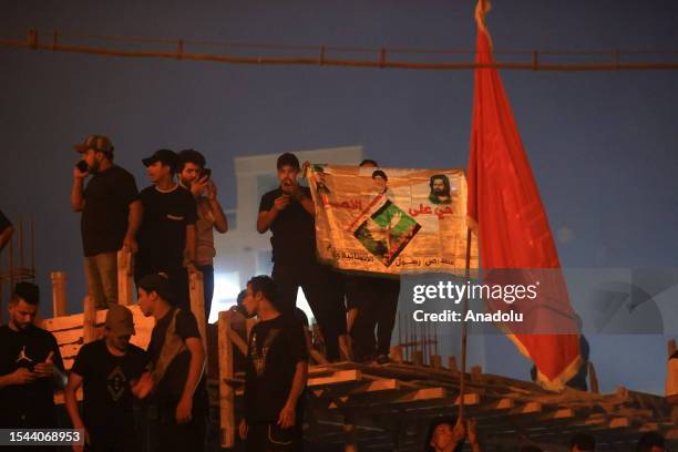 Followers of Shia cleric Muqtada al-Sadr storm the Swedish Embassy as they protest against the act of Quran burning in Baghdad, Iraq on July 20,...