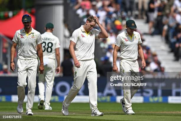 Australia's Cameron Green reacts after seeing a LBW decision against England's Zak Crawley overturned on review on day two of the fourth Ashes...