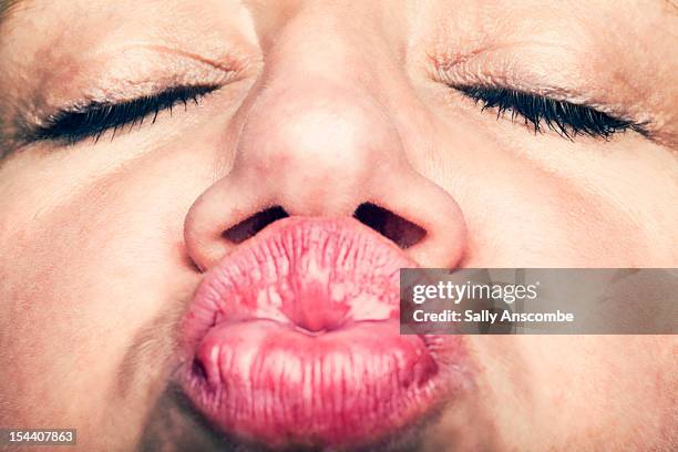 mouth - puckered up mouth stock pictures, royalty-free photos & images