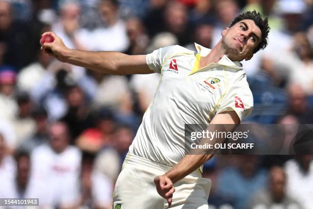 Australia's Pat Cummins bowls on day two of the fourth Ashes cricket Test match between England and Australia at Old Trafford cricket ground in...