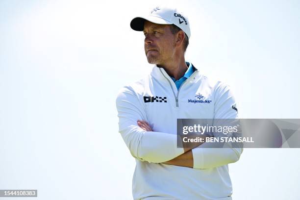 Sweden's Henrik Stenson waits on the 17th green on day one of the 151st British Open Golf Championship at Royal Liverpool Golf Course in Hoylake,...