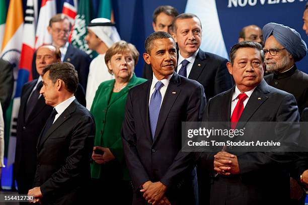 President Barack Obama pictured in the group photograph of leaders taken at the G20 Summit in Cannes, France, 4th January 2011. Behind him is...