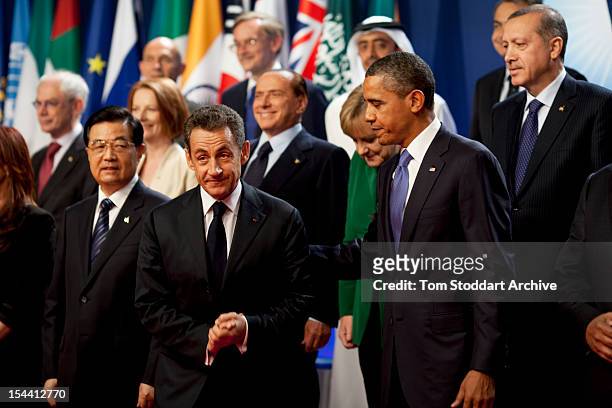 President Barack Obama pictured with President Nicolas Sarkozy in the group photograph of leaders taken at the G20 Summit in Cannes, France, 4th...