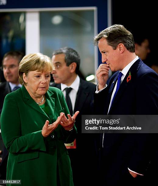 British Prime Minister David Cameron and Chancellor Angela Merkel of Germany chat during the G20 Summit in Cannes, France, 3rd January 2011.