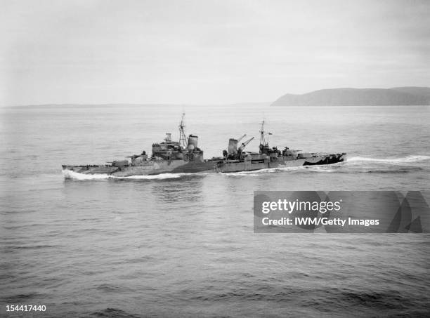 The Royal Navy During The Second World War, A broadside aerial view of HMS SHEFFIELD underway in Scapa Flow, 28 October 1941.