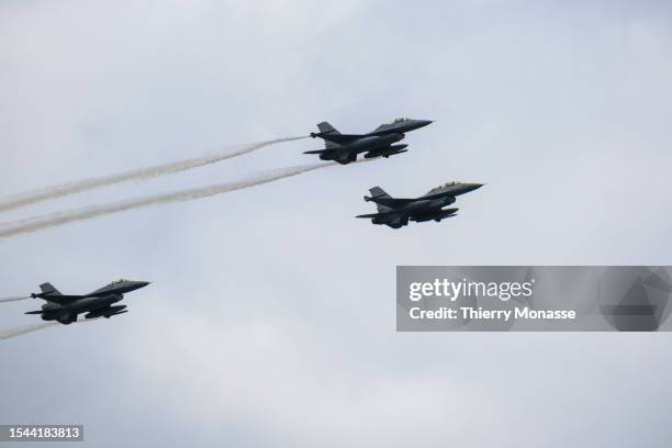 Three General Dynamics F-16 Fighting Falcon fly for a final training flight before the July 21 parade on July 19 in Brussels, Belgium. The Belgian...