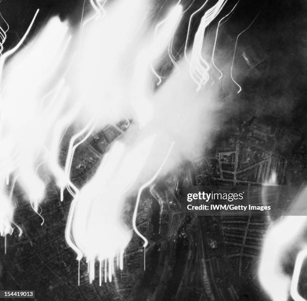 Royal Air Force Bomber Command, 1942-1945, Vertical aerial photograph taken during the major night raid on Lubeck, Germany on 28/29 March 1942. On...