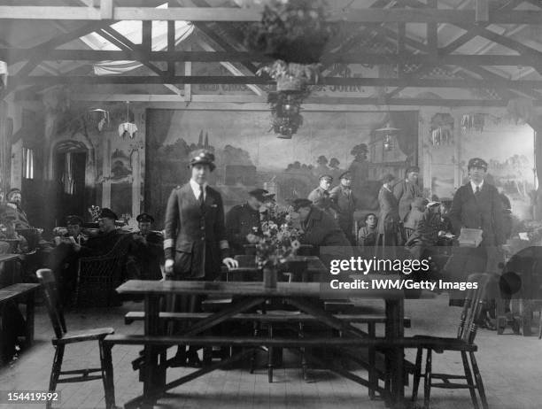 Women At Work During The First World War: Voluntary Aid Detachment, A general view of the interior of the British Red Cross Society and OSJJ...