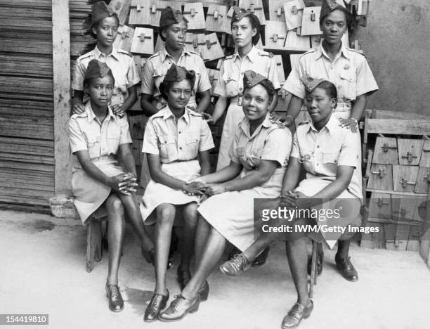 The Auxiliary Territorial Service In Trinidad A group of ATS clerks at work in the storeroom of the Trinidad Base Command, Port of Spain, Trinidad in...