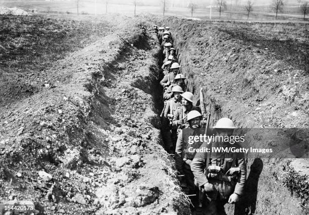 Ministry Of Information First World War Official Collection, The King's Liverpool Regiment moving along a communication trench leading to the front...