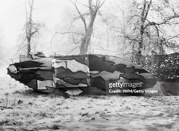 Camouflage During The First World War, A camouflaged dummy tank at the Royal Engineer's School of Camouflage, Kensington Gardens, London, during the...
