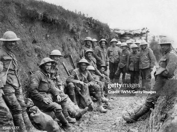 Ministry Of Information First World War Official Collection, Men of Royal Irish Rifles resting in a communication during the opening hours of the...