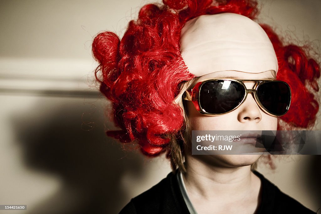 Boy in Clown Wig and Evis Glasses