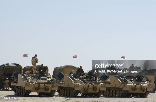 British Forces In Iraq British Army Stormer armoured vehicles fitted with the Shielder minelaying system, in Kuwait during preparations for Operation...