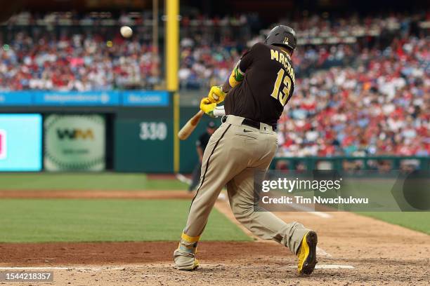 Manny Machado of the San Diego Padres hits a solo home run during the sixth inning against the Philadelphia Phillies at Citizens Bank Park on July...