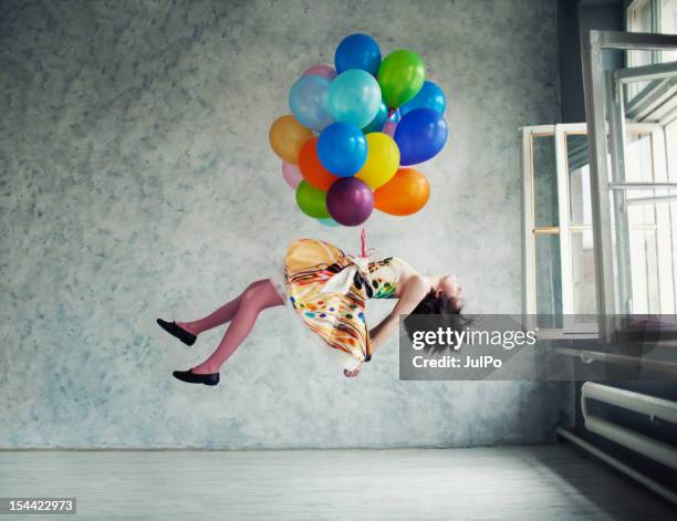 balloons - mid air color stock pictures, royalty-free photos & images