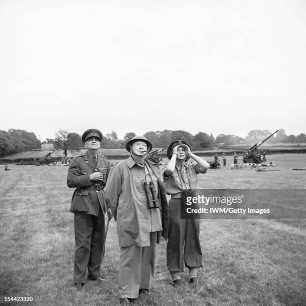 Winston Churchill During The Second World War In The United Kingdom, Winston Churchill, his daughter, Mary, and General Sir Frederick Pile watch a...