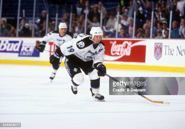 Brian Bradley of the Tampa Bay Lightning skates on the ice during an NHL game in February, 1996 at the Thunderdome in St. Petersburg, Florida.