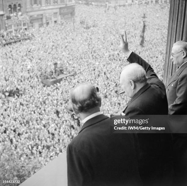 Winston Churchill In The Second World War, Churchill waves to crowds in Whitehall on the day he broadcast to the nation that the war with Germany had...