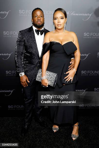 Yo Gotti and Angela Simmons attend the Shawn Carter Foundation 20th Anniversary Black Tie Gala at Pier 60 on July 14, 2023 in New York City.