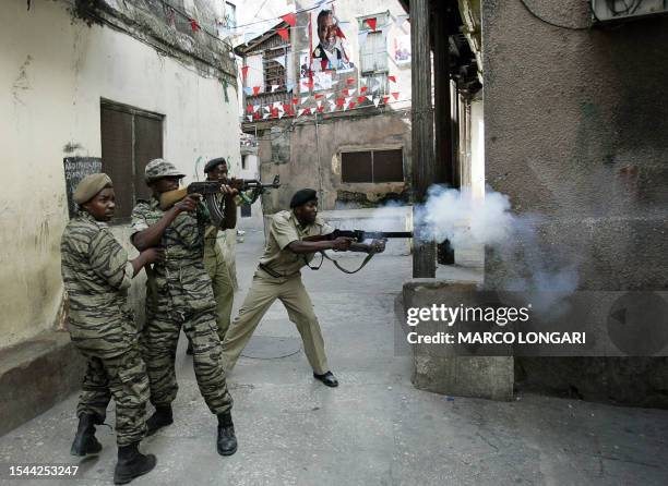 Tanzanian army fires tear gas and live ammunitions in the area of the Forodhani polling station in Stone Town, 30 October 2005. Soldiers fired shots...