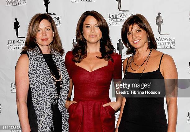 Nancy Heim, Laura Baron and Paula Pinhas attend the the John Wayne Cancer Institute Auxiliary annual awards luncheon at Beverly Hills Hotel on...
