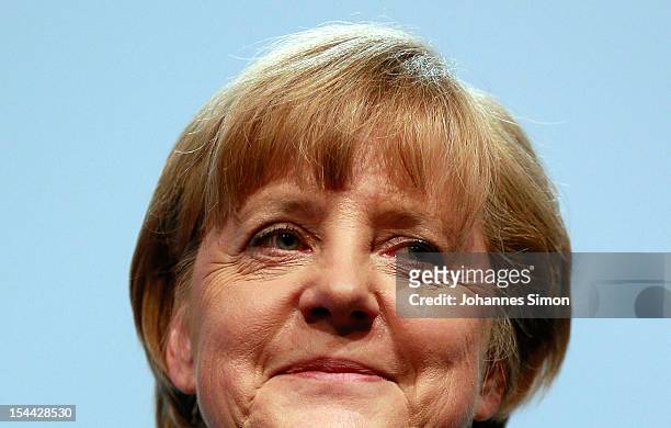 German Chancellor Angela Merkel, who is also chairwoman of the Christian Democratic Union , reacts after delivering a speech at the Christian Social...