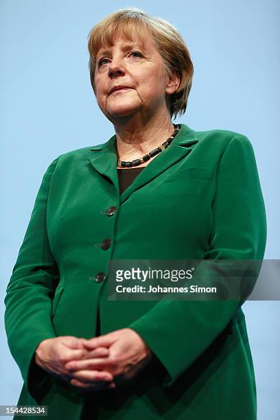 German Chancellor Angela Merkel, who is also chairwoman of the Christian Democratic Union , reacts after delivering a speech at the Christian Social...
