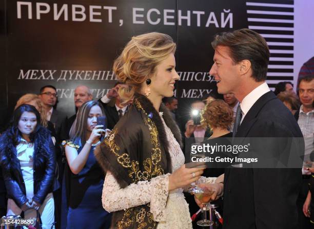 Supermodel Eva Herzigova and Gregorio Marsiaj are seen during a fashion show to celebrate the launch of Capital Partners' luxury Esentai Mall, as...