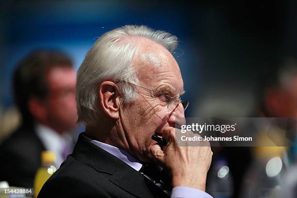 Edmund Stoiber, former Minister-President of Bavaria, listens to the speech of German Chancellor Angela Merkel during the Christian Social Union of...