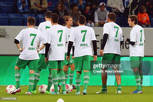 Players of Greuther Fuerth have name and number of Hoffenheim's badly injured player Boris Vukcevic on their jersey prior to the Bundesliga match...