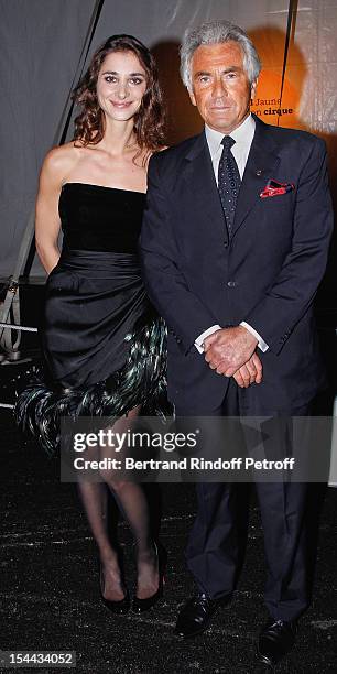 Lorraine Ricard, wearing a Givenchy vintage dress, and Jean-Paul Enthoven attends 'Bal Jaune 2012' organized by the Ricard Corporate Foundation for...