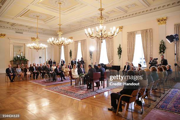 In this handout image provided by the Grand-Ducal Court of Luxembourg, Prince Guillaume of Luxembourg and Countess Stephanie de Lannoy attend their...