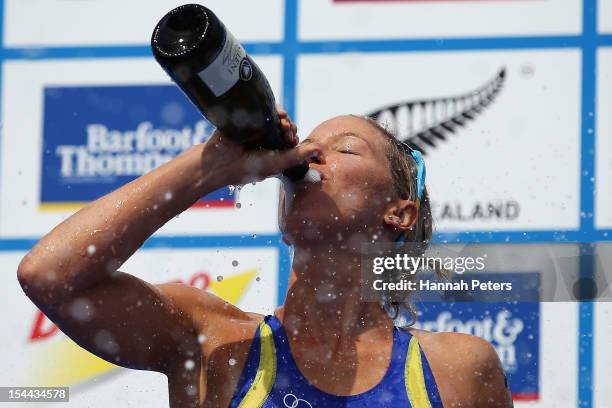 Lisa Norden of Sweden celebrates after winning the World Series title during the 2012 ITU Elite Women's World triathlon Grand Final on October 20,...