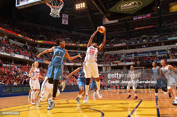 Jessica Davenport of the Indiana Fever rebounds against the Minnesota Lynx during Game three of the 2012 WNBA Finals on October 19, 2012 at Bankers...