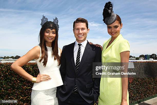 Models Jessica Gomes, Jason Dundas and Samantha Harris attend Caulfield Cup Day at Caulfield Racecourse on October 20, 2012 in Melbourne, Australia.