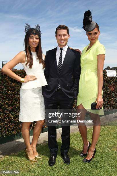 Models Jessica Gomes, Jason Dundas and Samantha Harris attend Caulfield Cup Day at Caulfield Racecourse on October 20, 2012 in Melbourne, Australia.